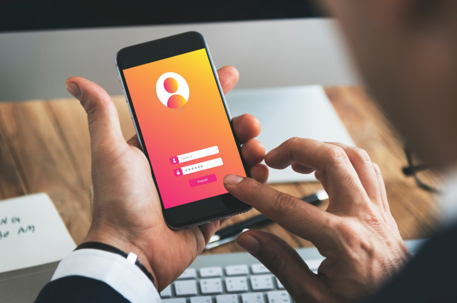 Person logging into a mobile app using secure username and password fields