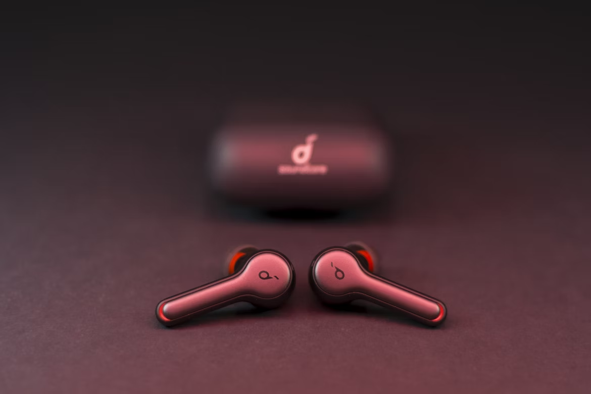 Anker Soundcore budget earbuds with charging case on dark background